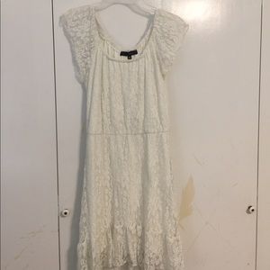 White lacy dress longer in the back then the front